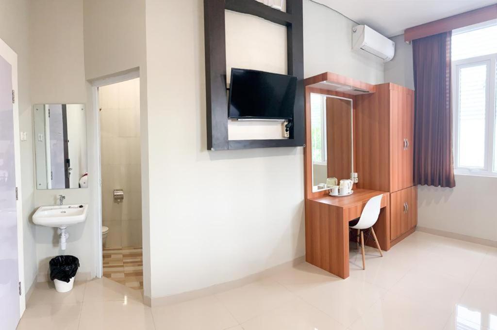 Oyo 2816 Privato Suite Kembaran Exterior photo